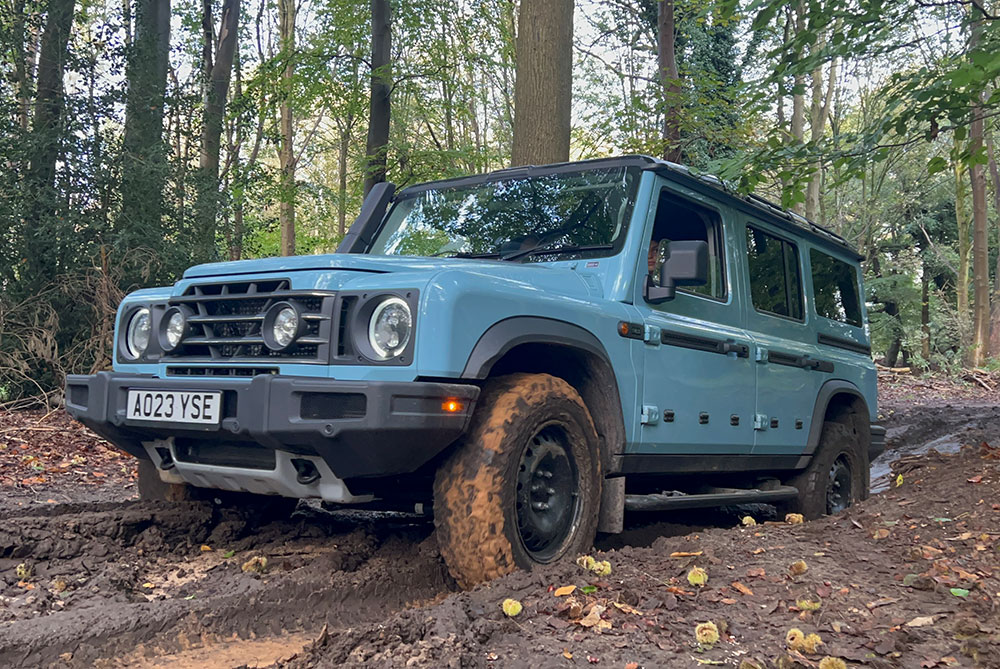 INEOS Grenadier driving over rough terrain.