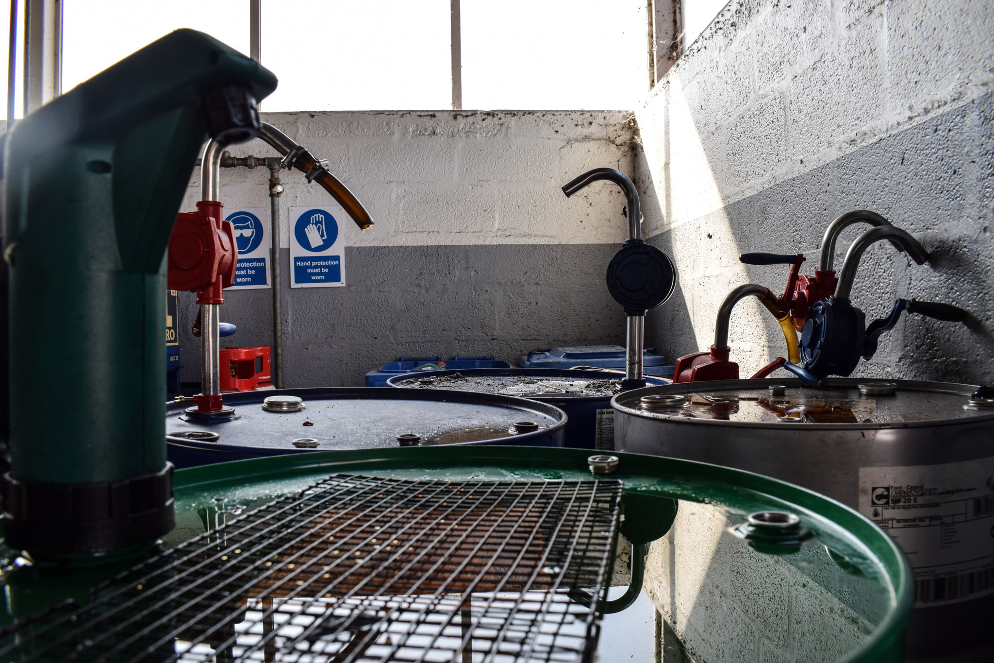 Oil kegs in workshop